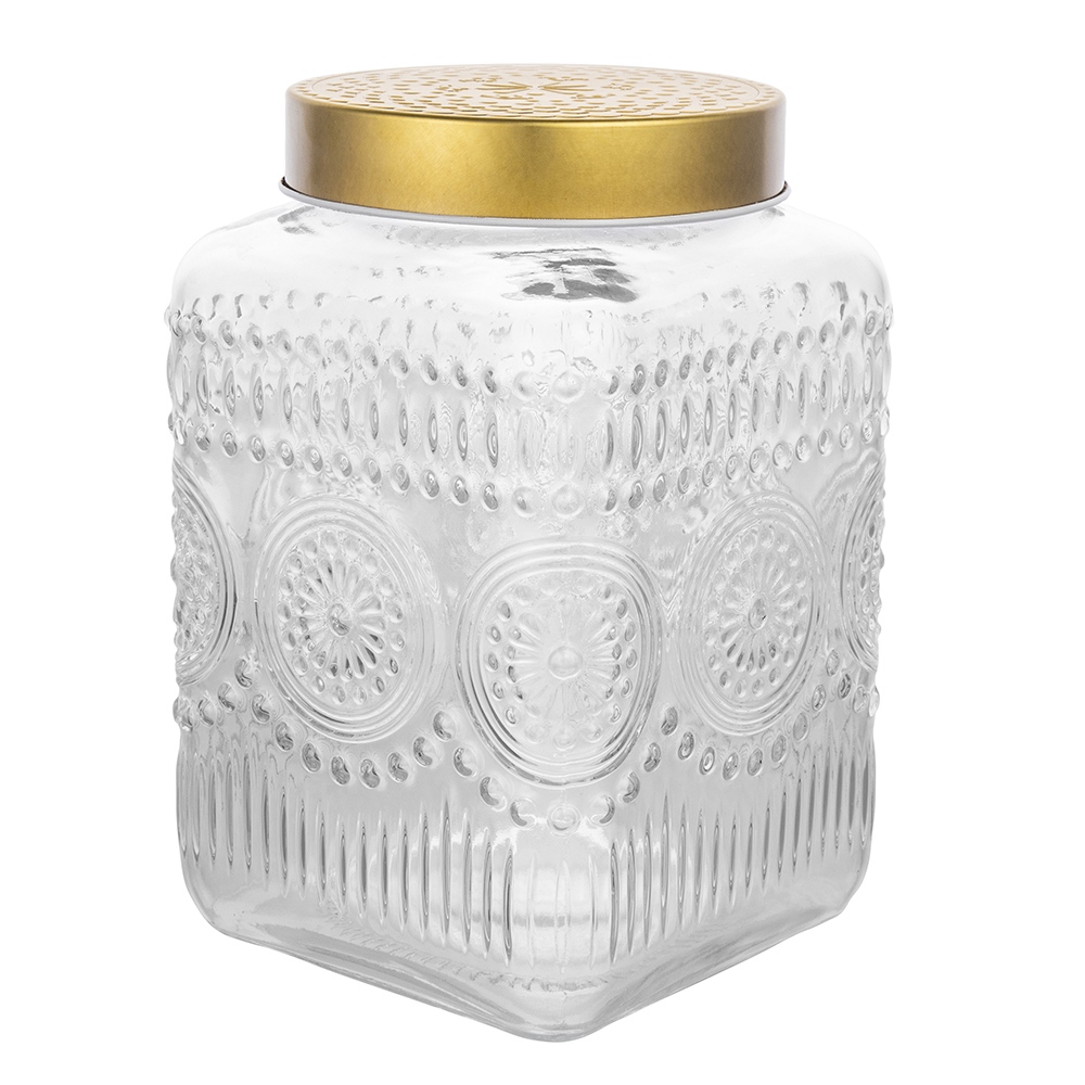 Glass storage jar with golden tin lid